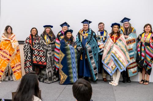 Graduate Students with Pendleton blankets